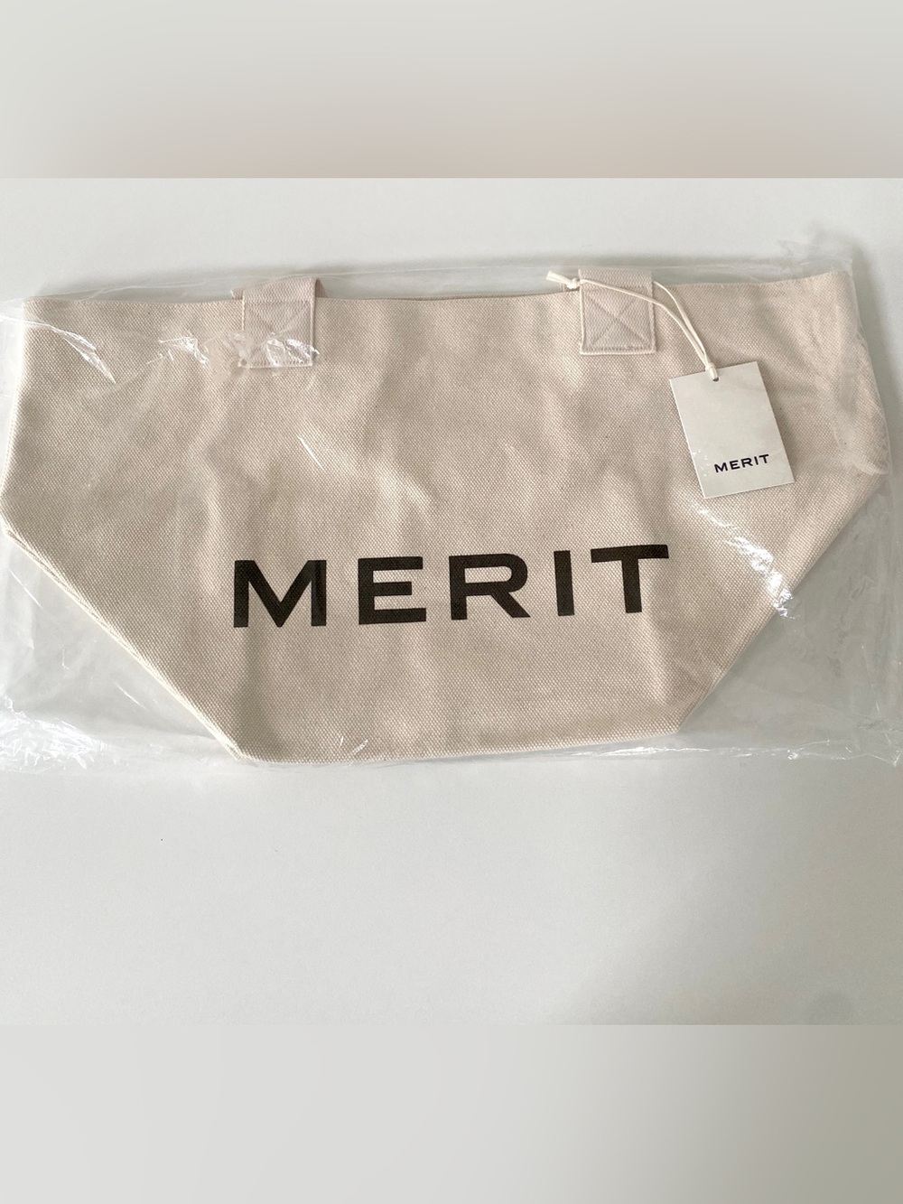 MERIT Canvas Tote Bag in Cream with Black Logo